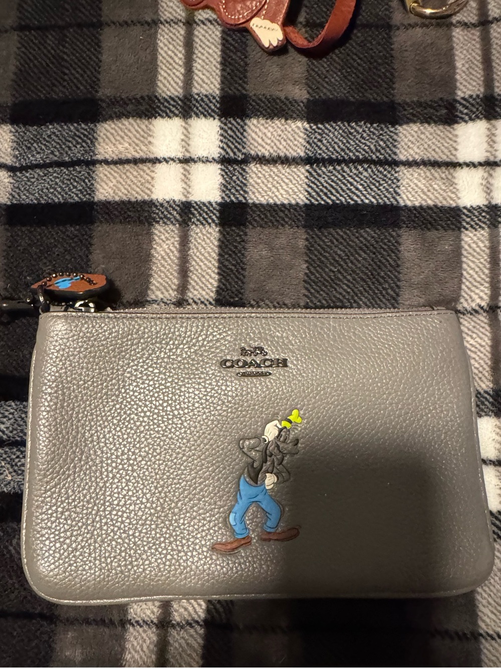Coach Disney wristlet with Goofy- light grey